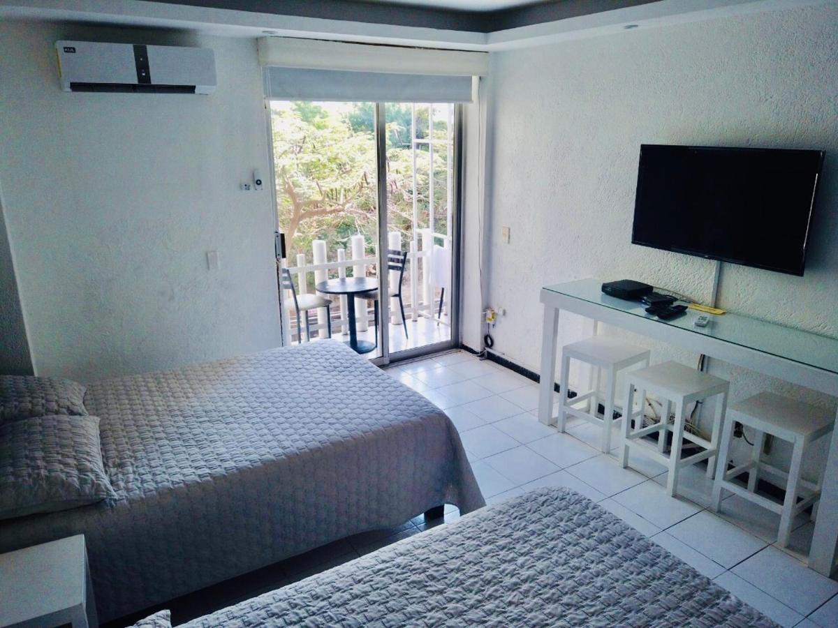 Acapulco Hotel Y Suites Mediterrane Bagian luar foto